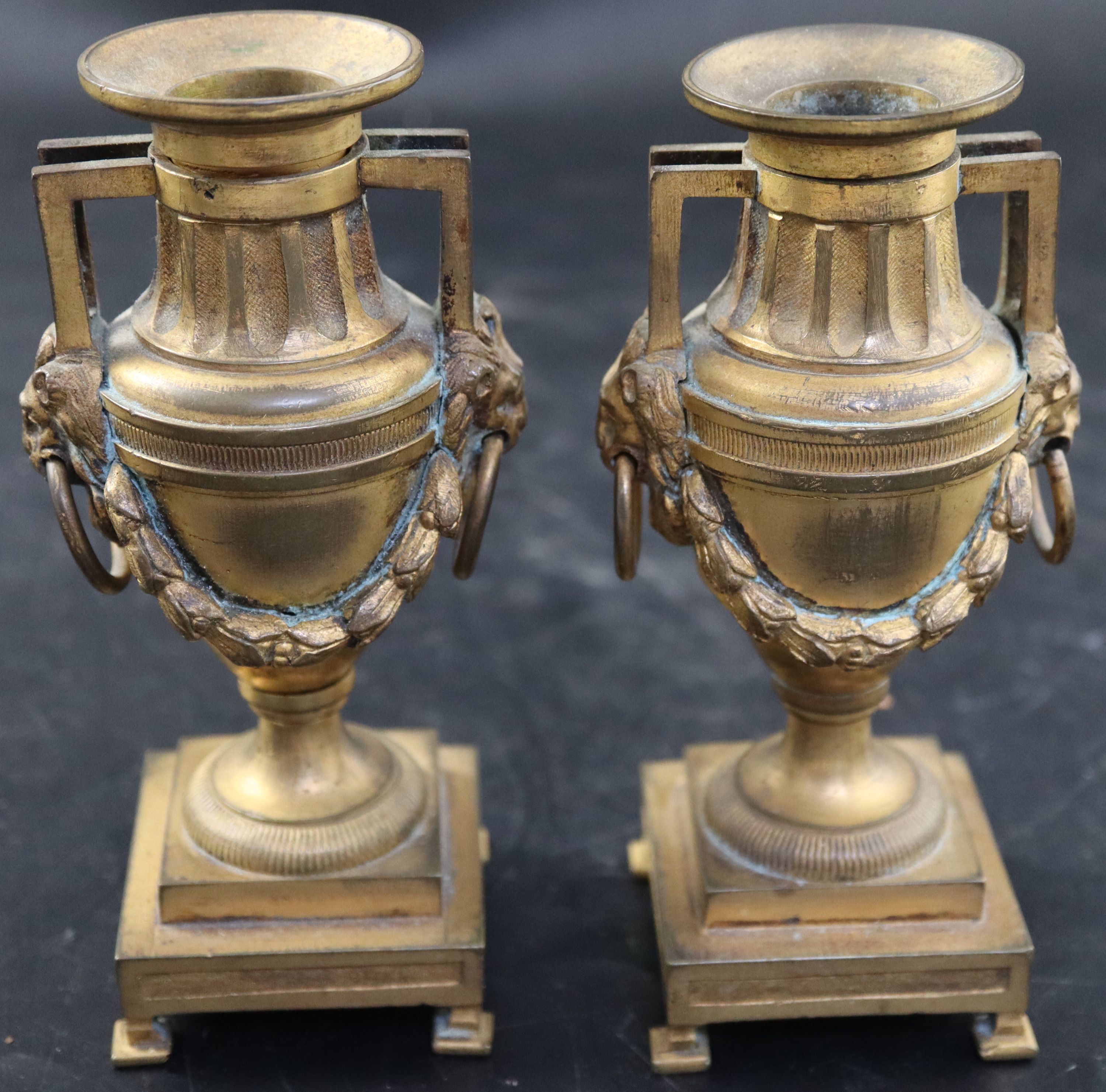 A pair of 19th century French ormolu urn shaped candlesticks, height 15cm